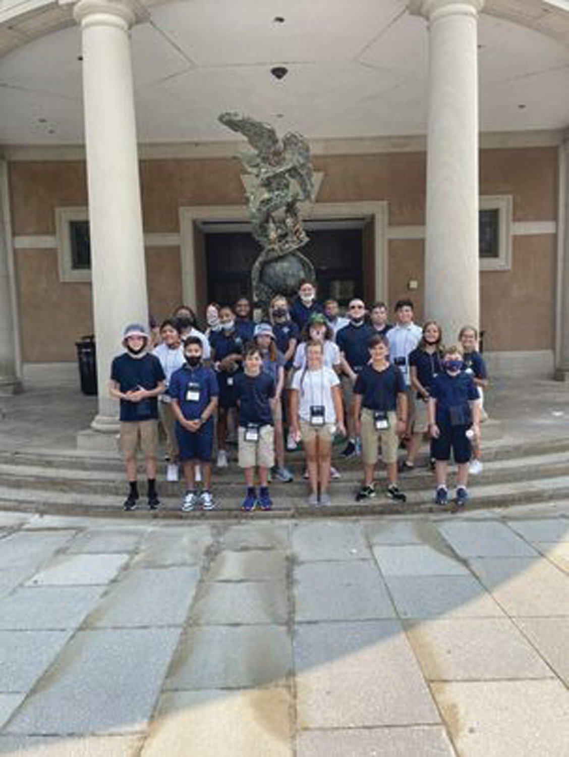 THE LAY OF THE LAND: Ryan Golditch, third from left, and the members of his James Madison group pose at Arlington National Cemetery.